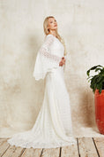 Load image into Gallery viewer, model wearing bohemian lace wedding dress with bell sleeves