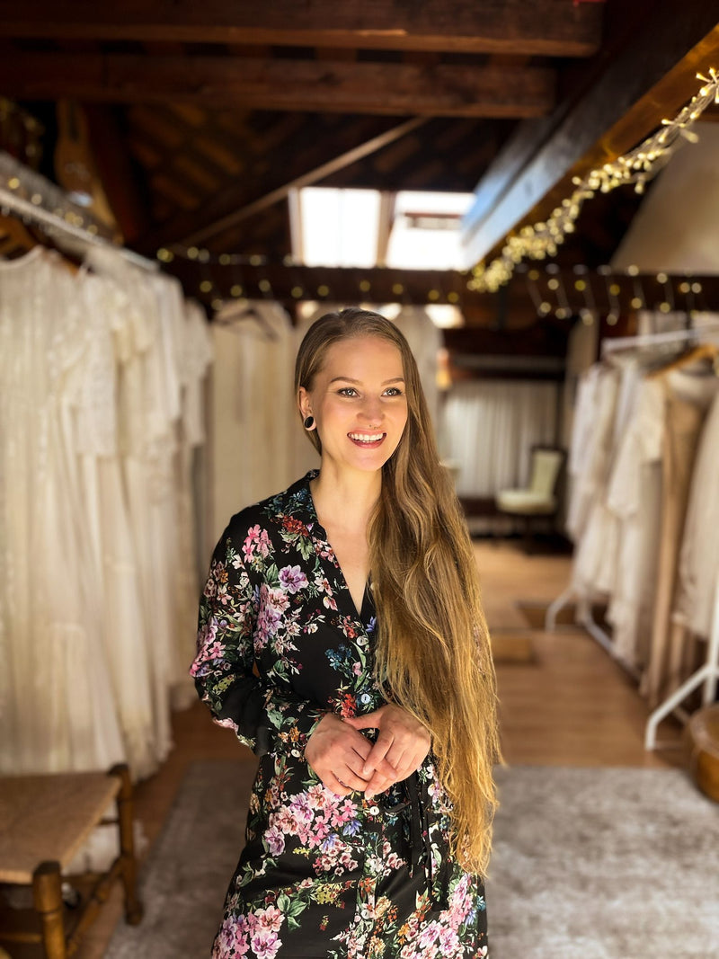 bridal consultant in a boho bridal showroom