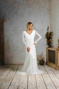 Load image into Gallery viewer, model wearing a modern bohemian lace wedding dress with sleeves