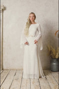Load and play video in Gallery viewer, model wearing a lace wedding dress with bell sleeves