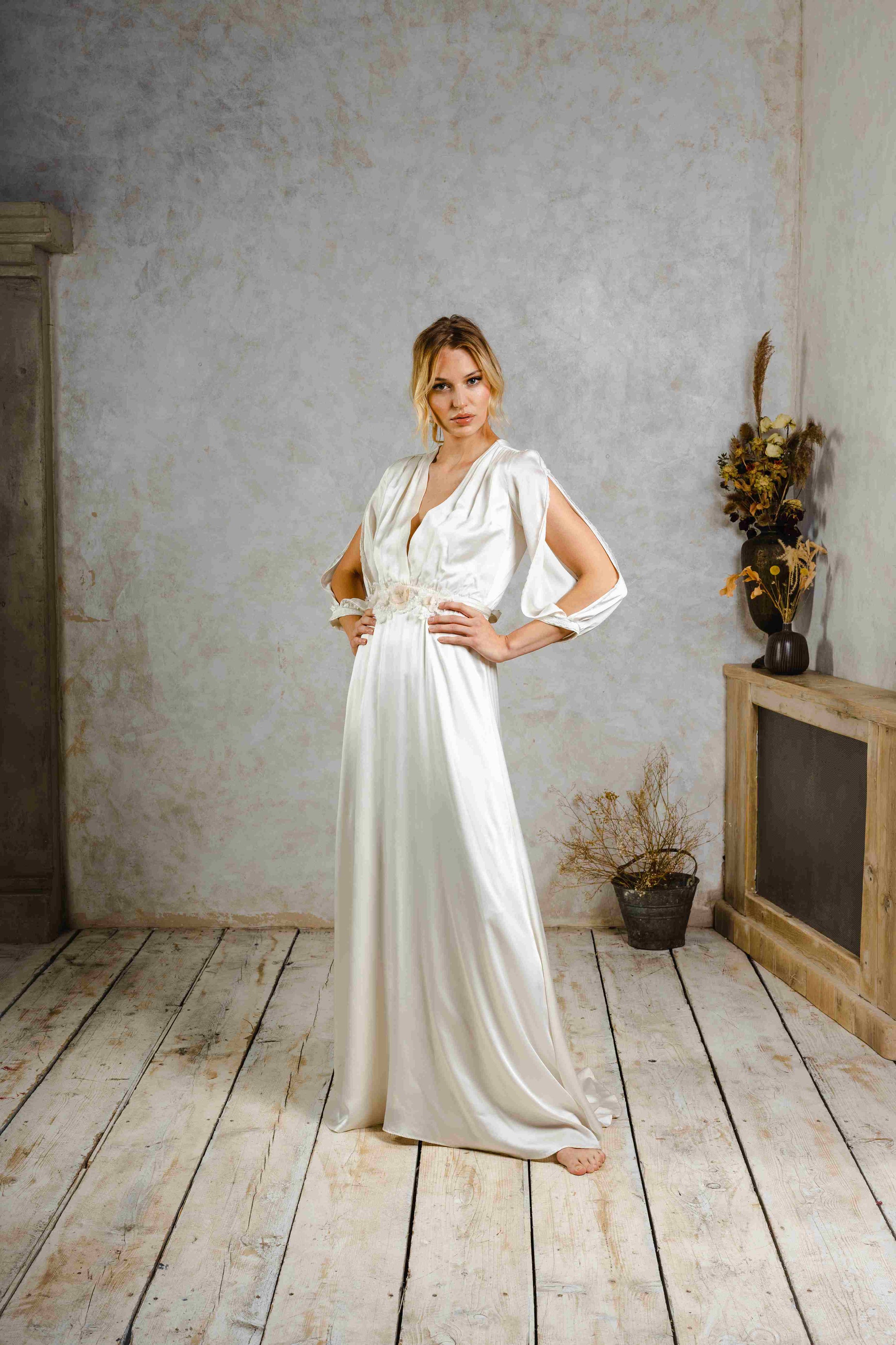 A model wearing a vintage-inspired wedding dress.