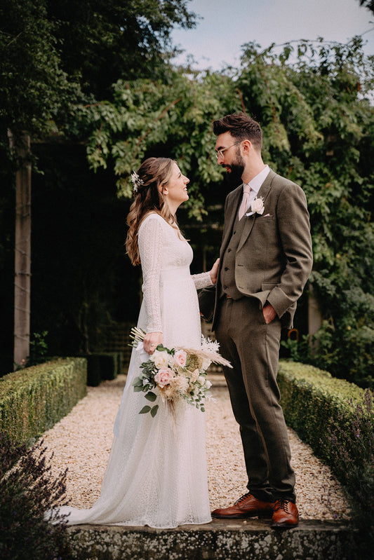 bride and groom lovingly looking at each other