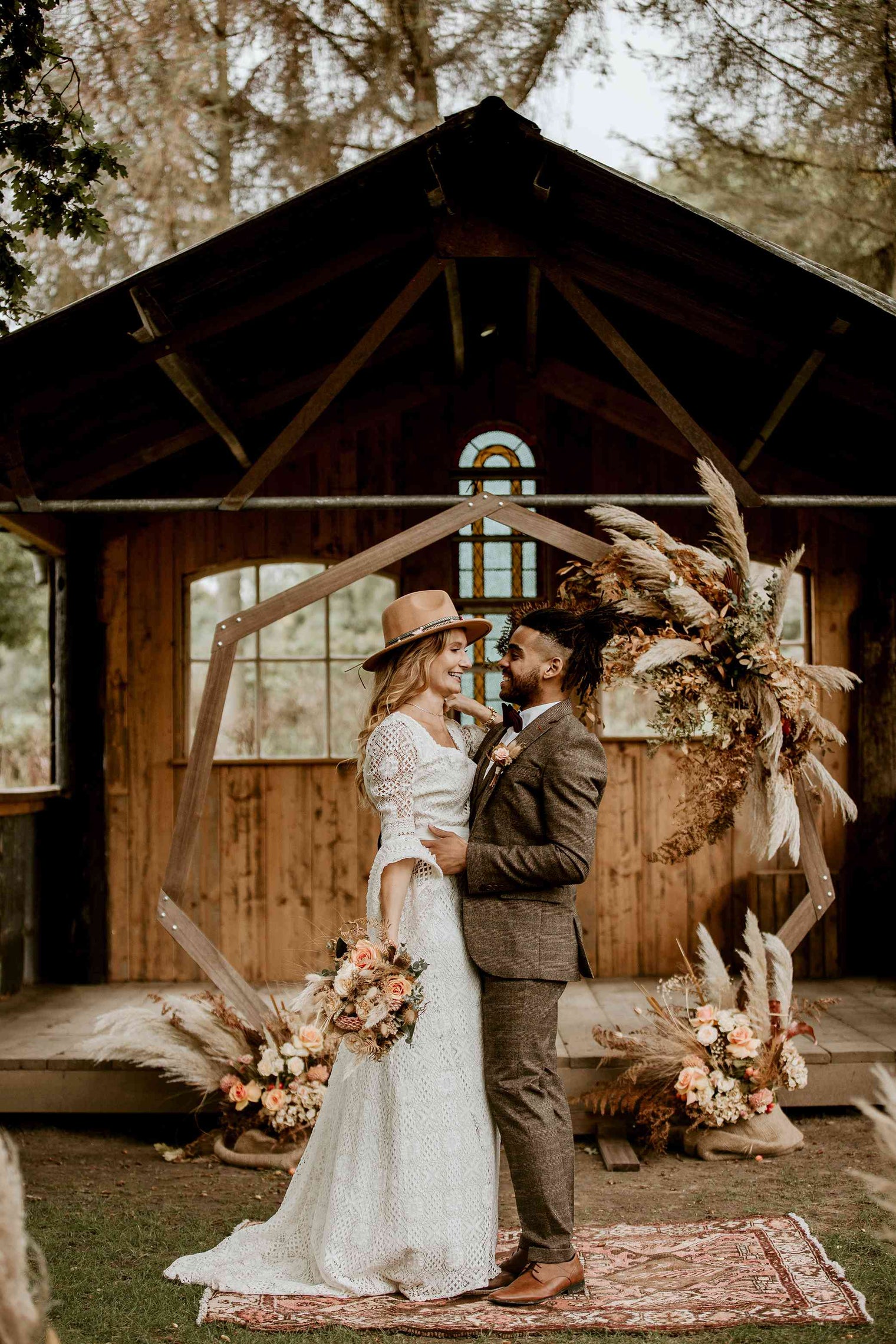 bride and groom having a bohemian wedding at the Oak Tree Barn