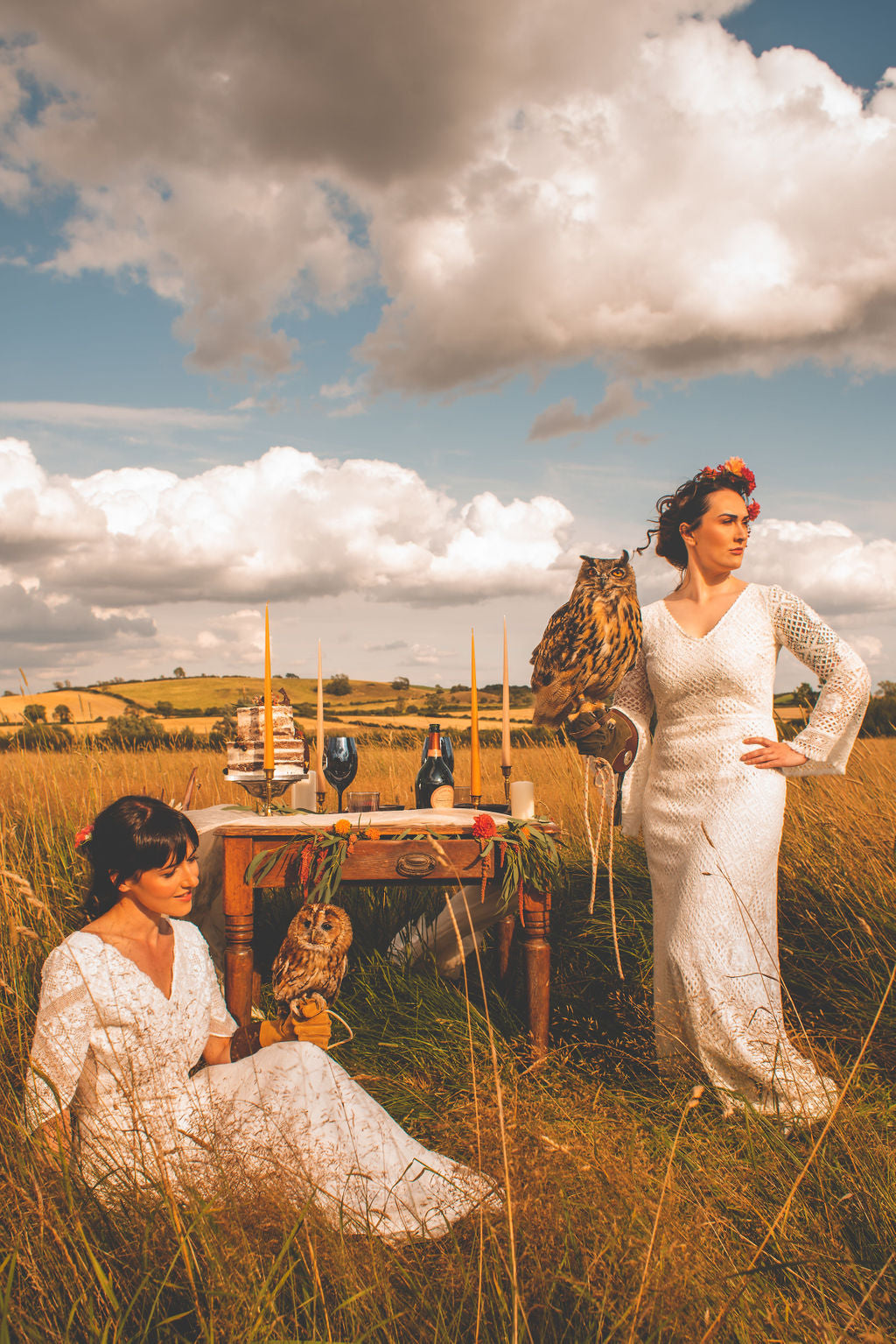 brides holding wedding owls