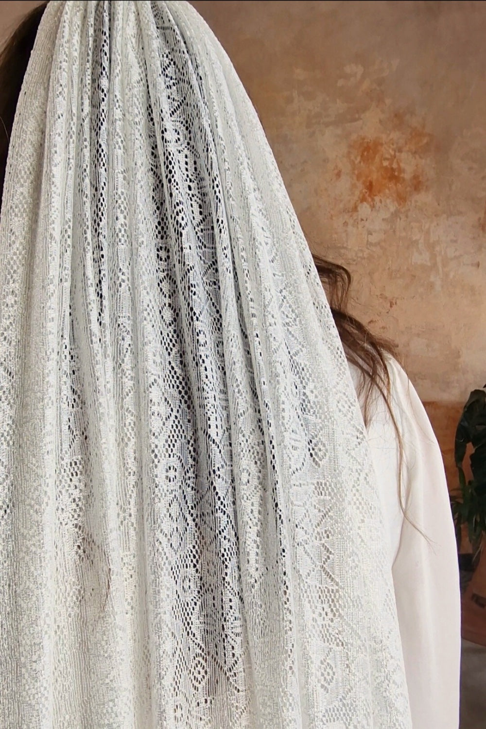 Cathedral length lace veil.