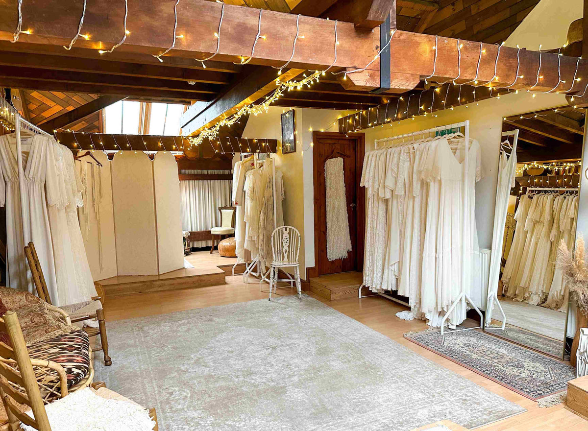 bridal showroom with fairy lights and beam ceiling