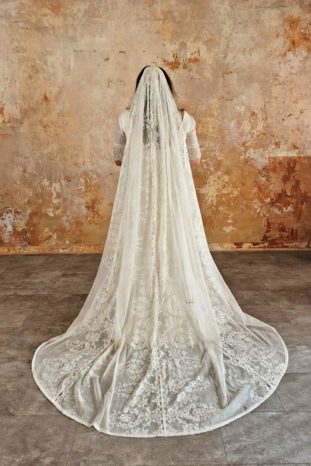 Cathedral length lace veil.