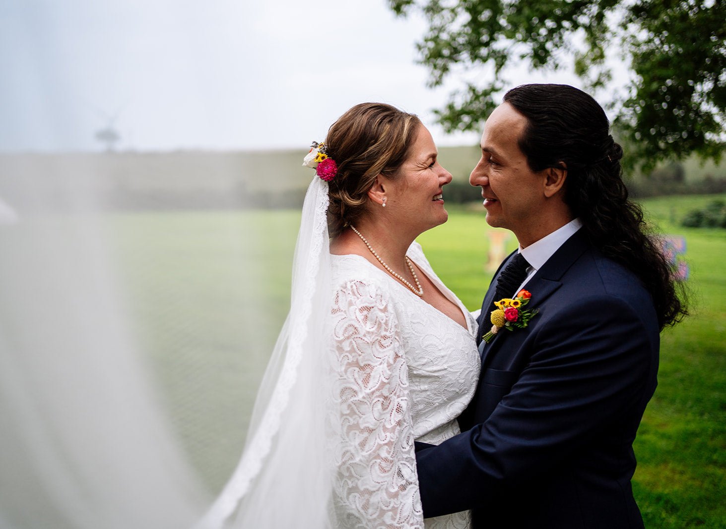 bride and groom embracing