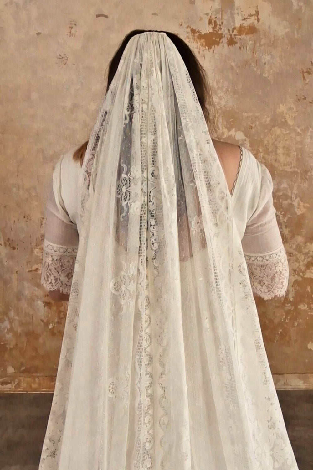 Cathedral length lace veil.
