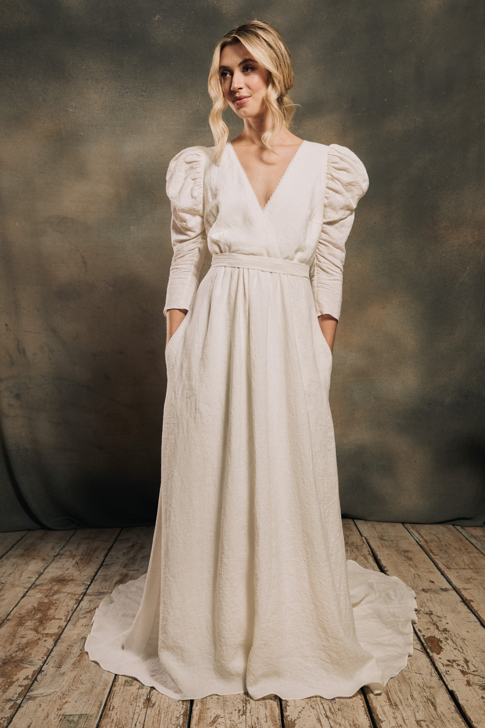 modern bohemian linen wedding dress with puffy sleeves