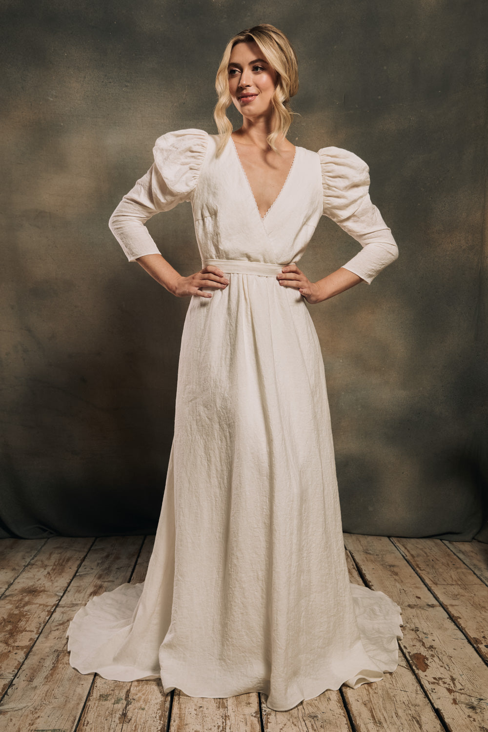 modern bohemian linen wedding dress with puffy sleeves