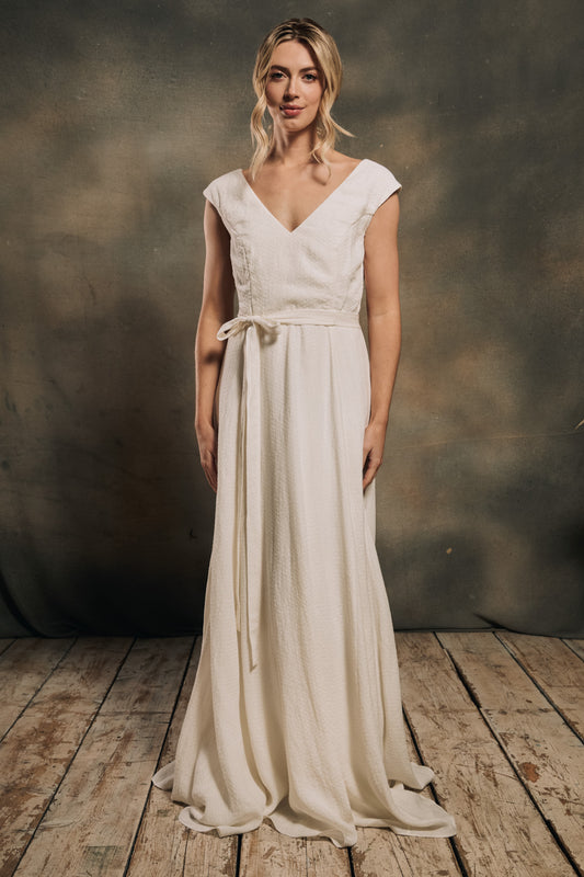 modern boho linen wedding dress with cap sleeves