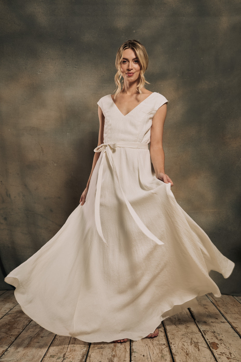 modern boho linen wedding dress with cap sleeves