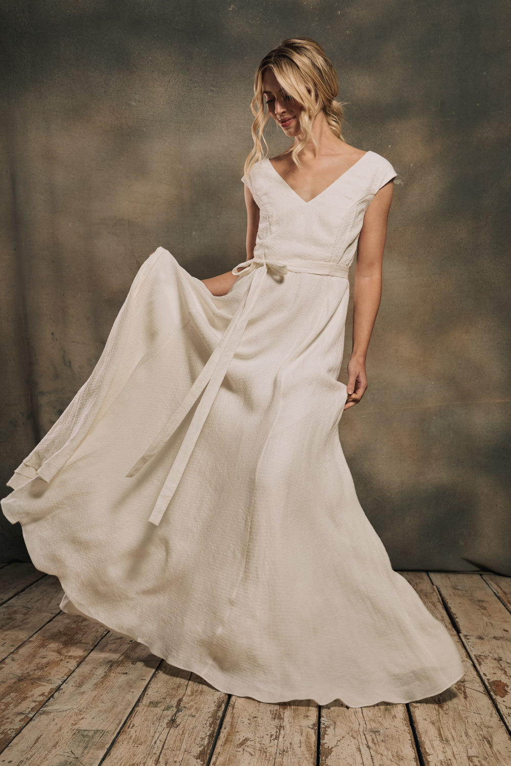 modern boho linen wedding dress with cap sleeves