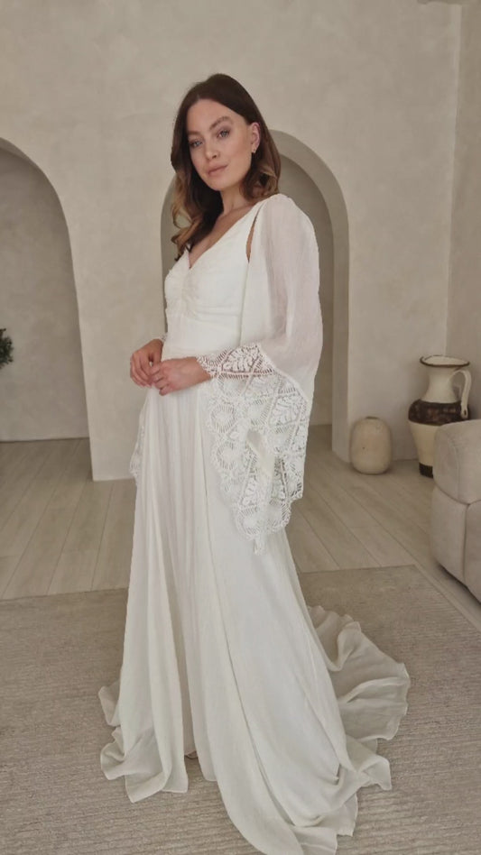 Model wearing a boho wedding dress.