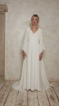 Load and play video in Gallery viewer, model wearing a sustainable wedding dress with detachable angel sleeves
