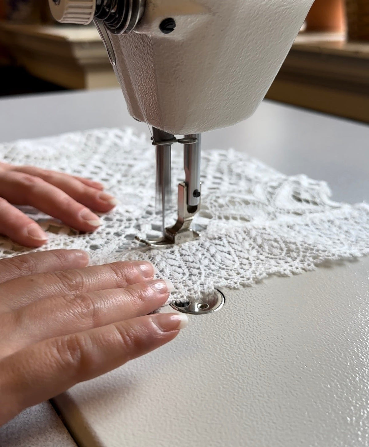 dress maker making a wedding dress