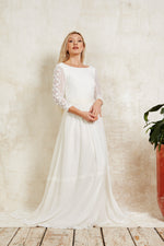 sustainable wedding dress with a lace top and high neckline