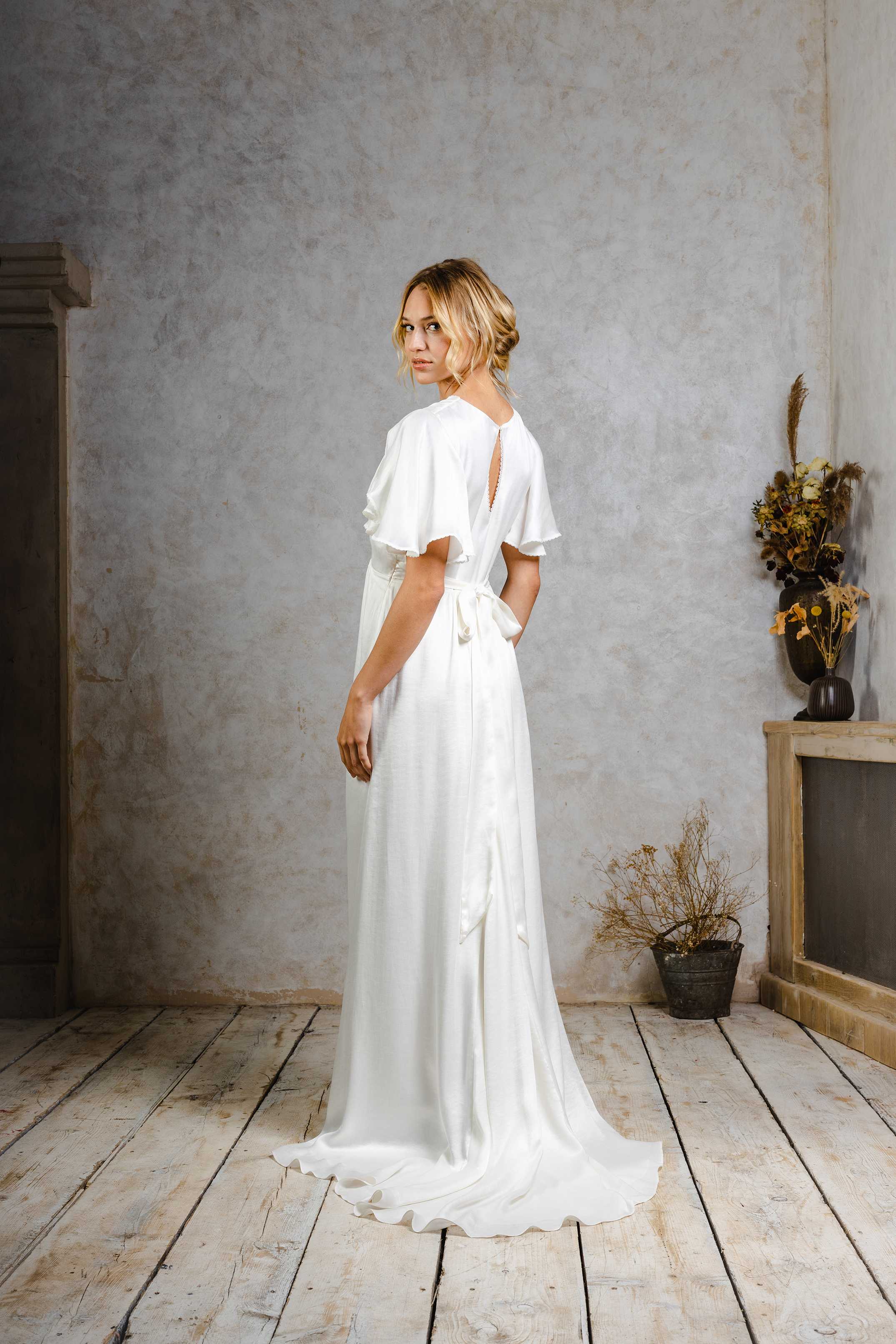 sustainable wedding dress with flutter sleeves