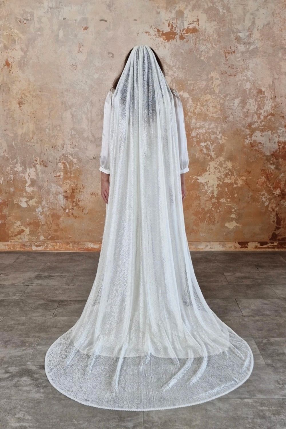 Cathedral length lace veil.