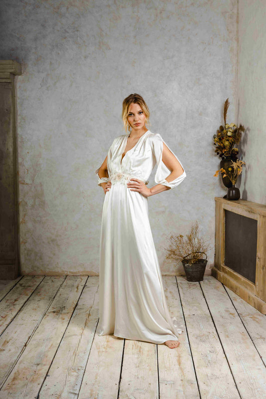 A model wearing a vintage-inspired wedding dress.