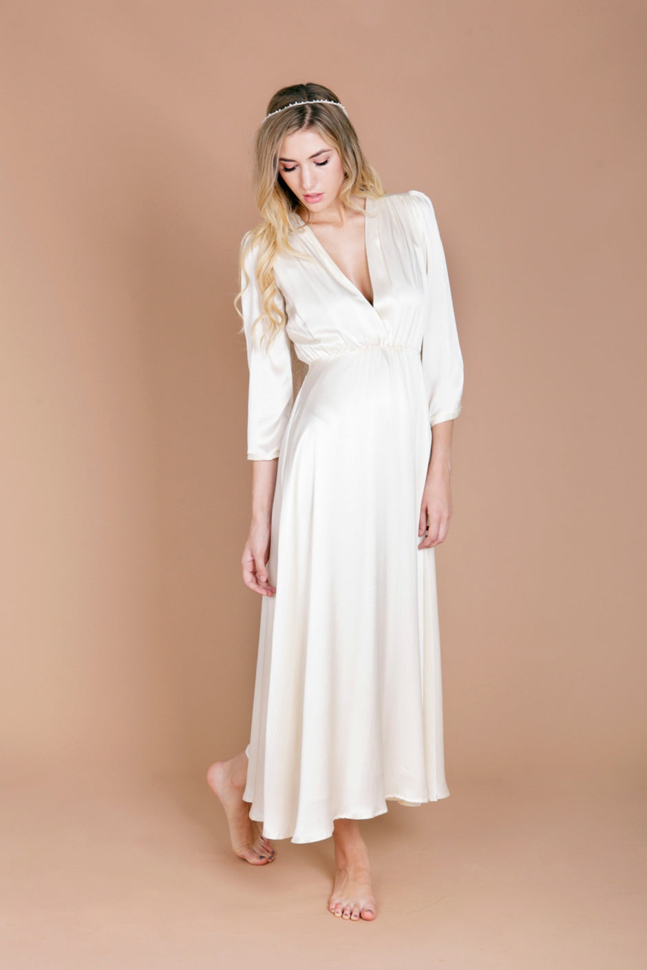 model wearing a vintage inspired wedding dress