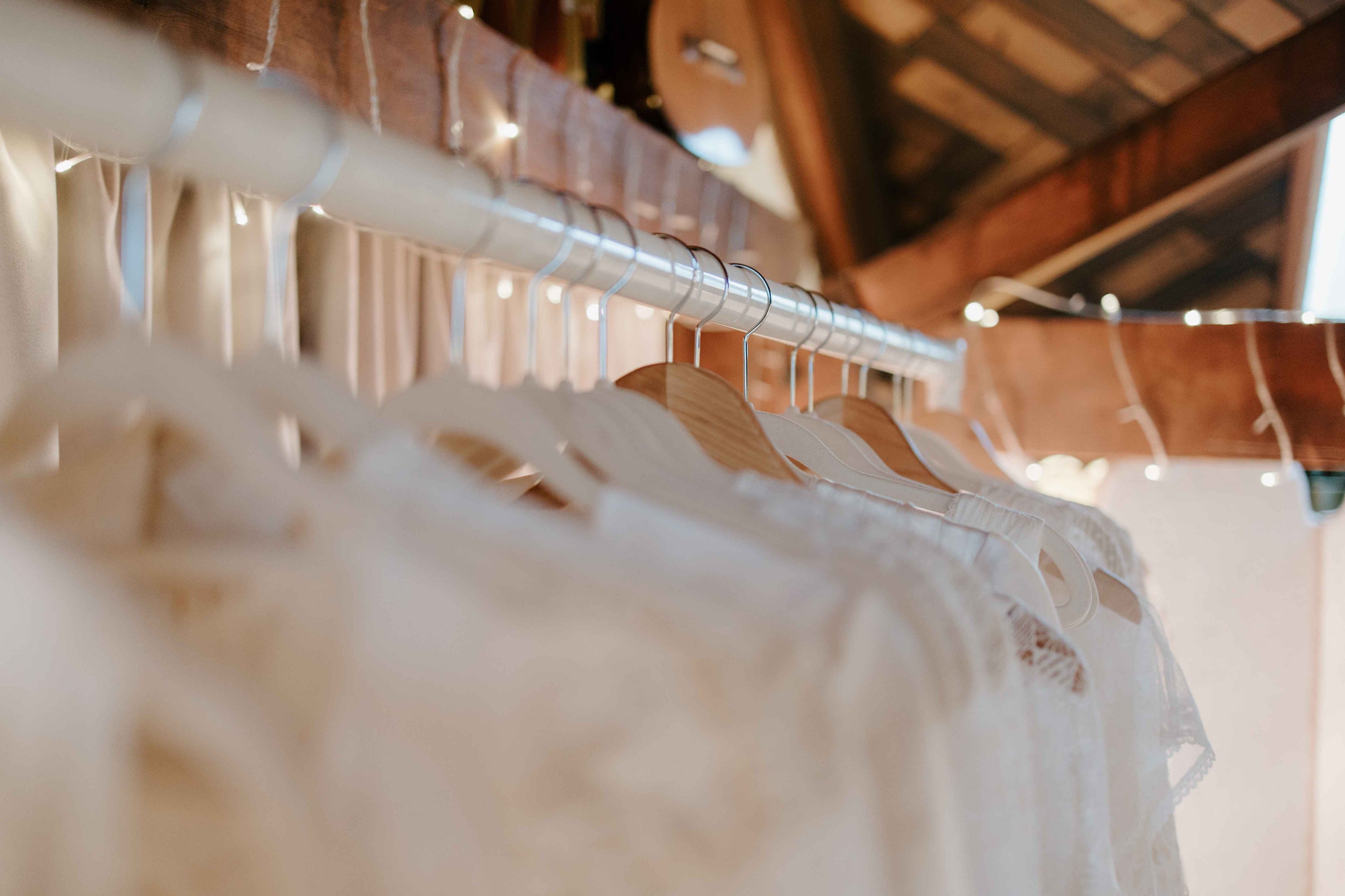 wedding dresses on a rail