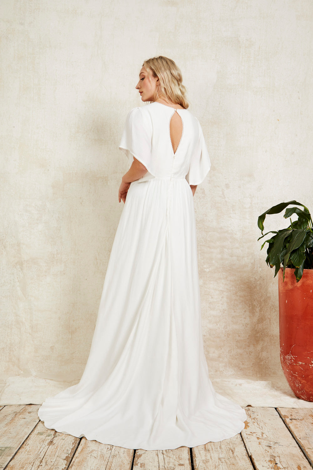 wedding dress with a skirt slit